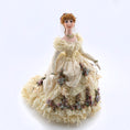 Load image into Gallery viewer, Stacy Hoffman doll in a decorative dress with floral details on a white background
