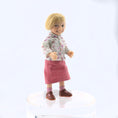 Load image into Gallery viewer, Catherine Muniere Doll with blonde hair wearing a floral shirt and pink skirt on a white background
