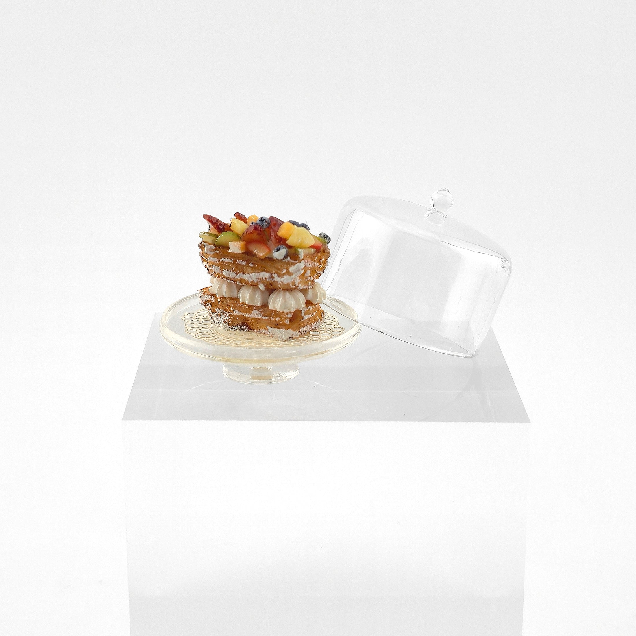 miniature French dessert on white background