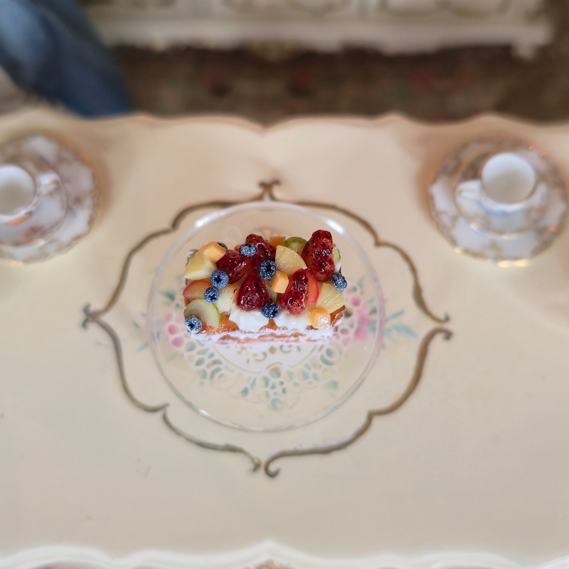 Small dessert with fruit on a decorative table