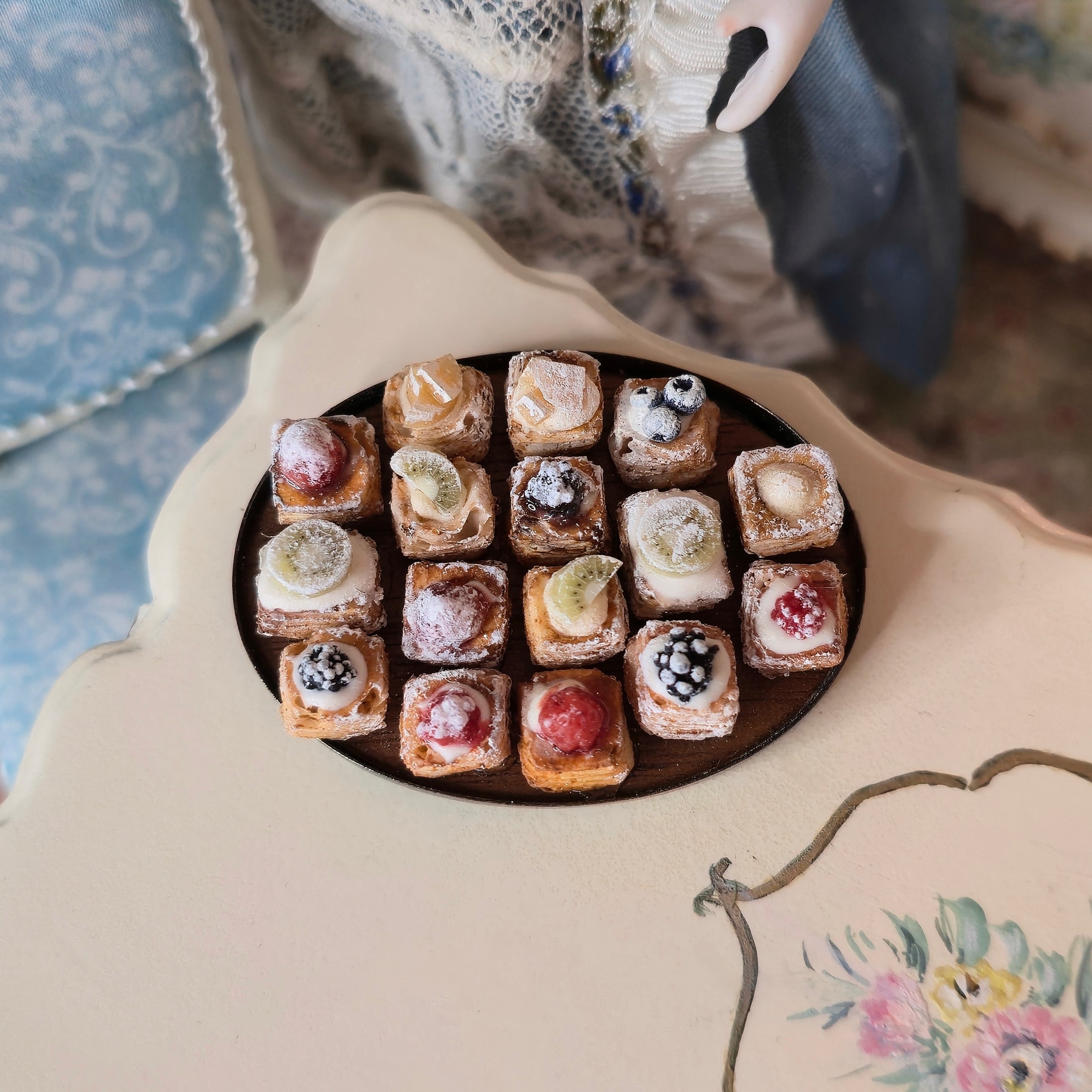 miniature pastries on platter, top view