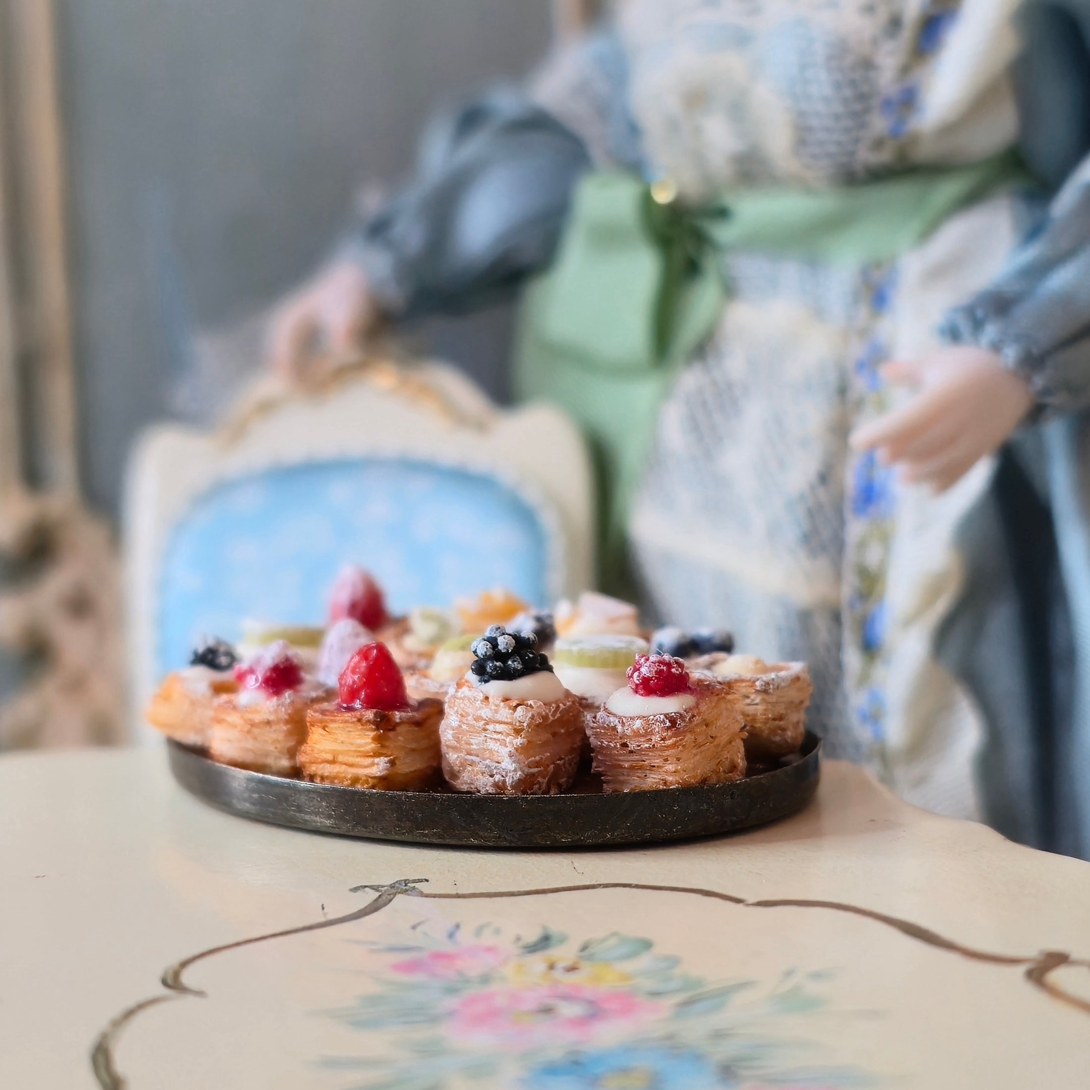 miniature pastries on platter, detail shot