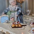 Load image into Gallery viewer, Miniature close-up of pastries on a table
