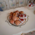 Load image into Gallery viewer, Miniature pastries on wooden serving board, on a table
