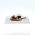 Load image into Gallery viewer, Café au lait with a dessert on a wooden tray on a white surface
