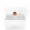 Load image into Gallery viewer, Small pastry on a stand with a clear dome cover on a white background
