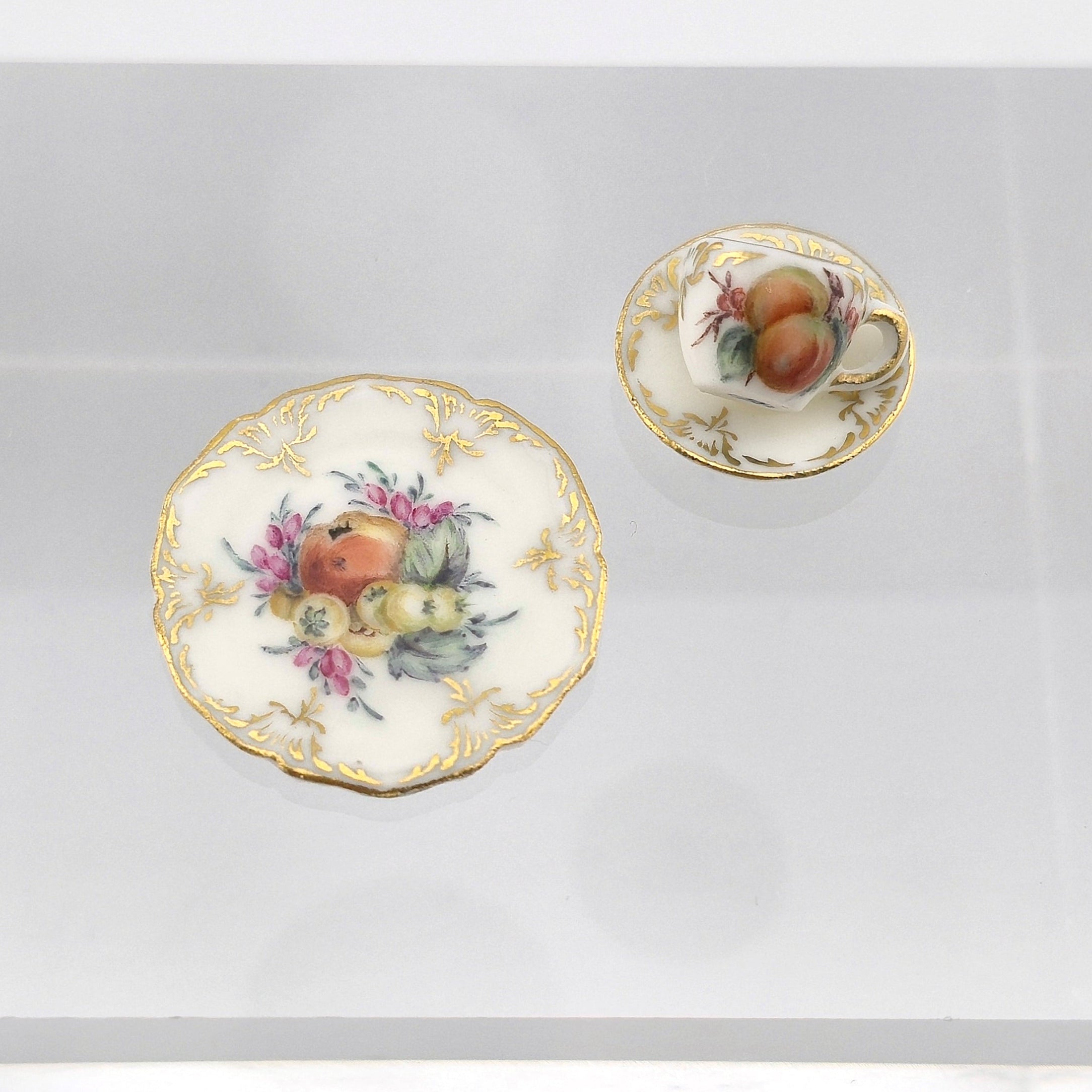 Hand painted Miyuki Nagashima porcelain set, on white background
