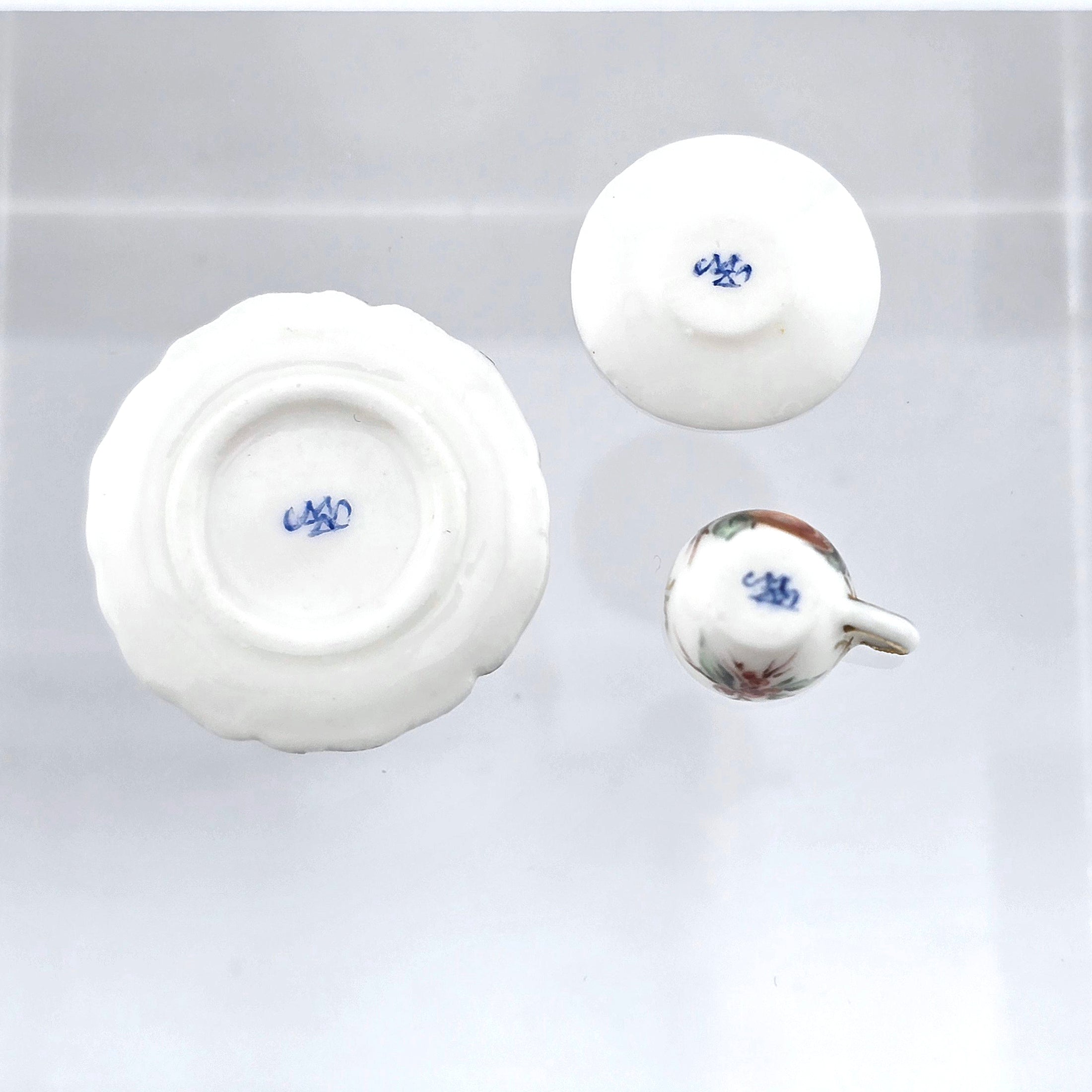Hand painted Miyuki Nagashima porcelain set, signed undersides