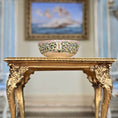 Load image into Gallery viewer, Decorative bowl on an ornate gold table with a blurred painting in the background

