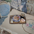 Load image into Gallery viewer, Miniature waffle with decorative plate and coffee cup on a floral table.
