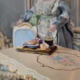 Load image into Gallery viewer, Miniature table setting with food and a doll in a decorative room.
