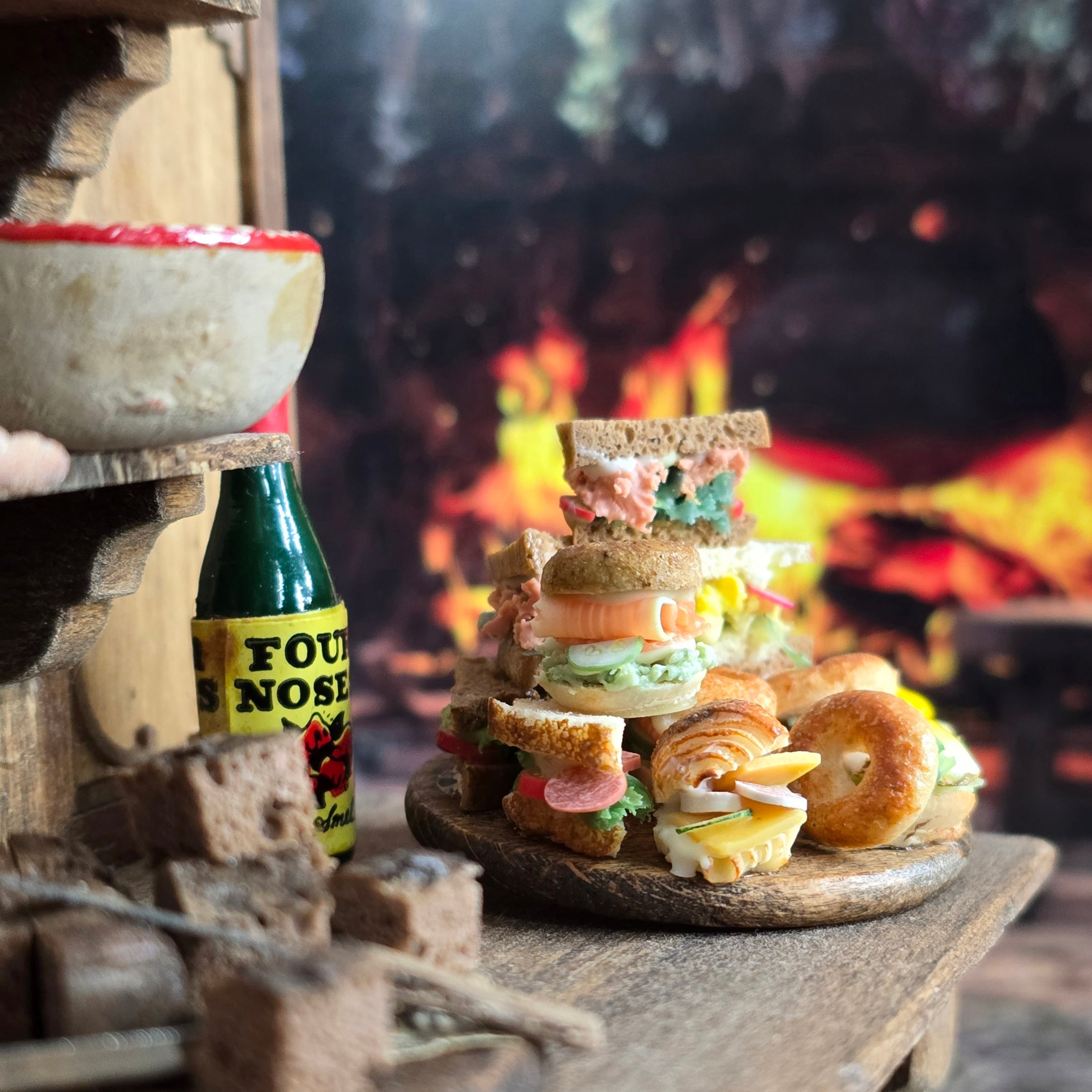 Stack of sandwiches on a wooden board 