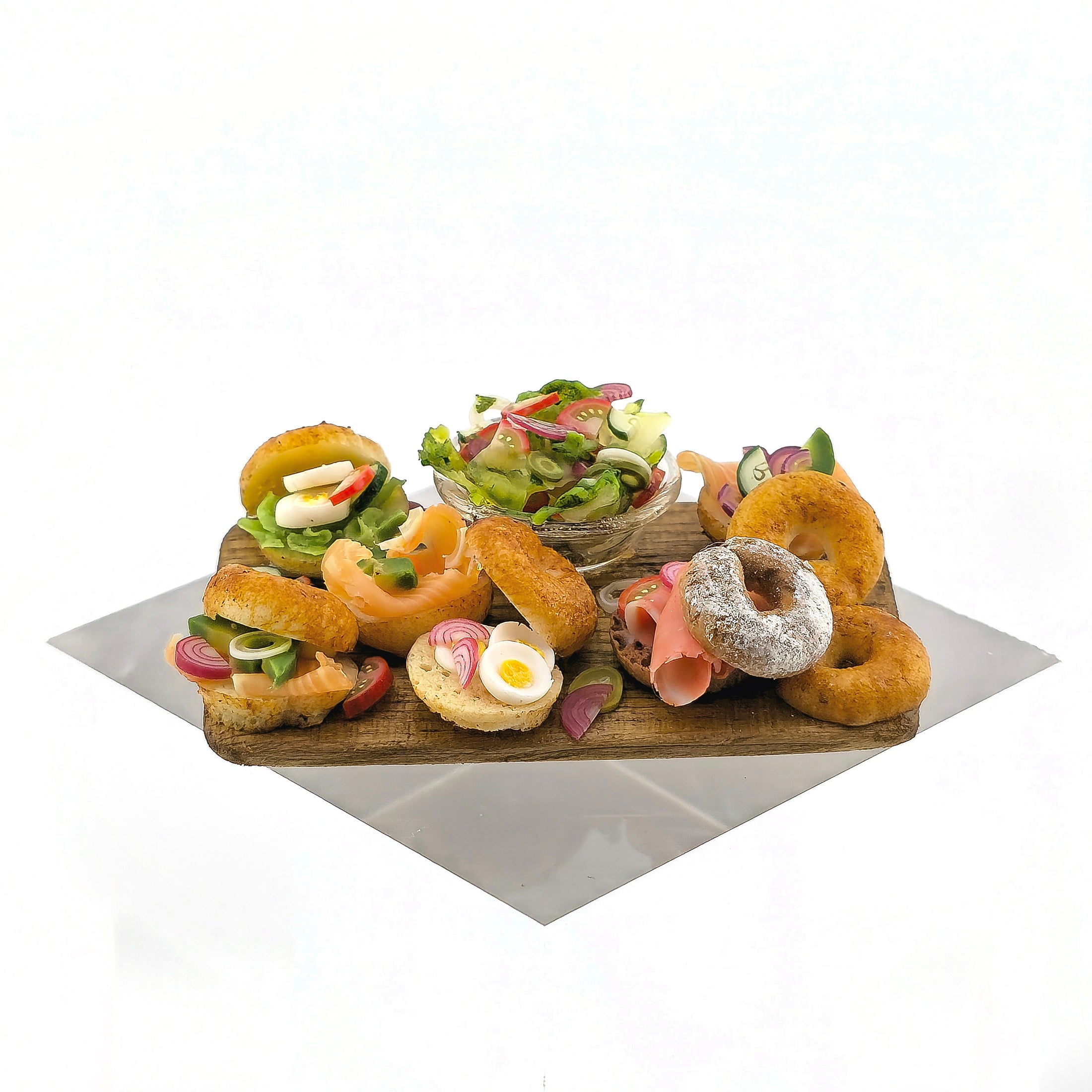 Brunch Bagel Charcuterie Serving Board on white background