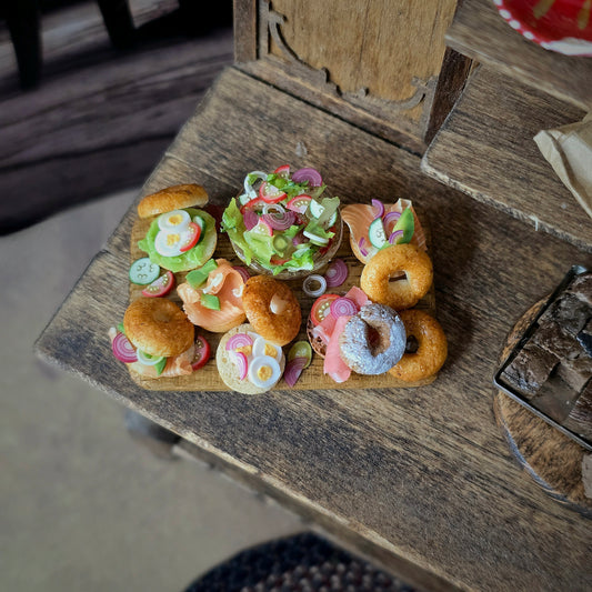 Brunch Bagel Charcuterie Serving Board on a rustic table
