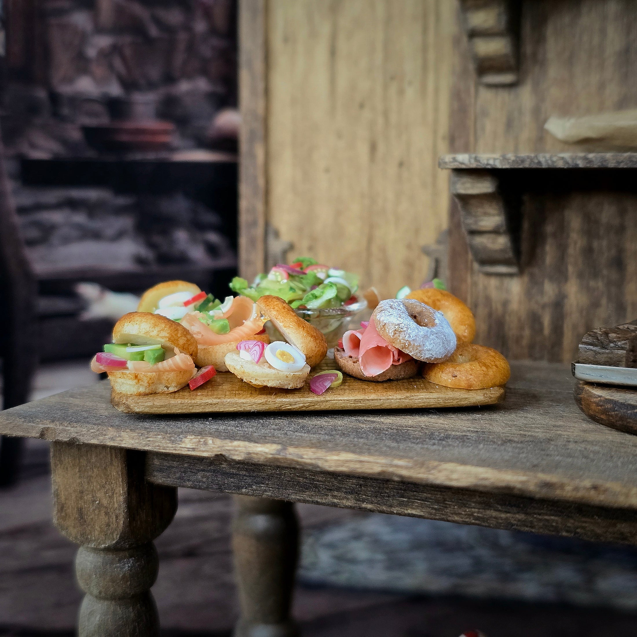 Brunch Bagel Charcuterie Serving Board on a wooden table