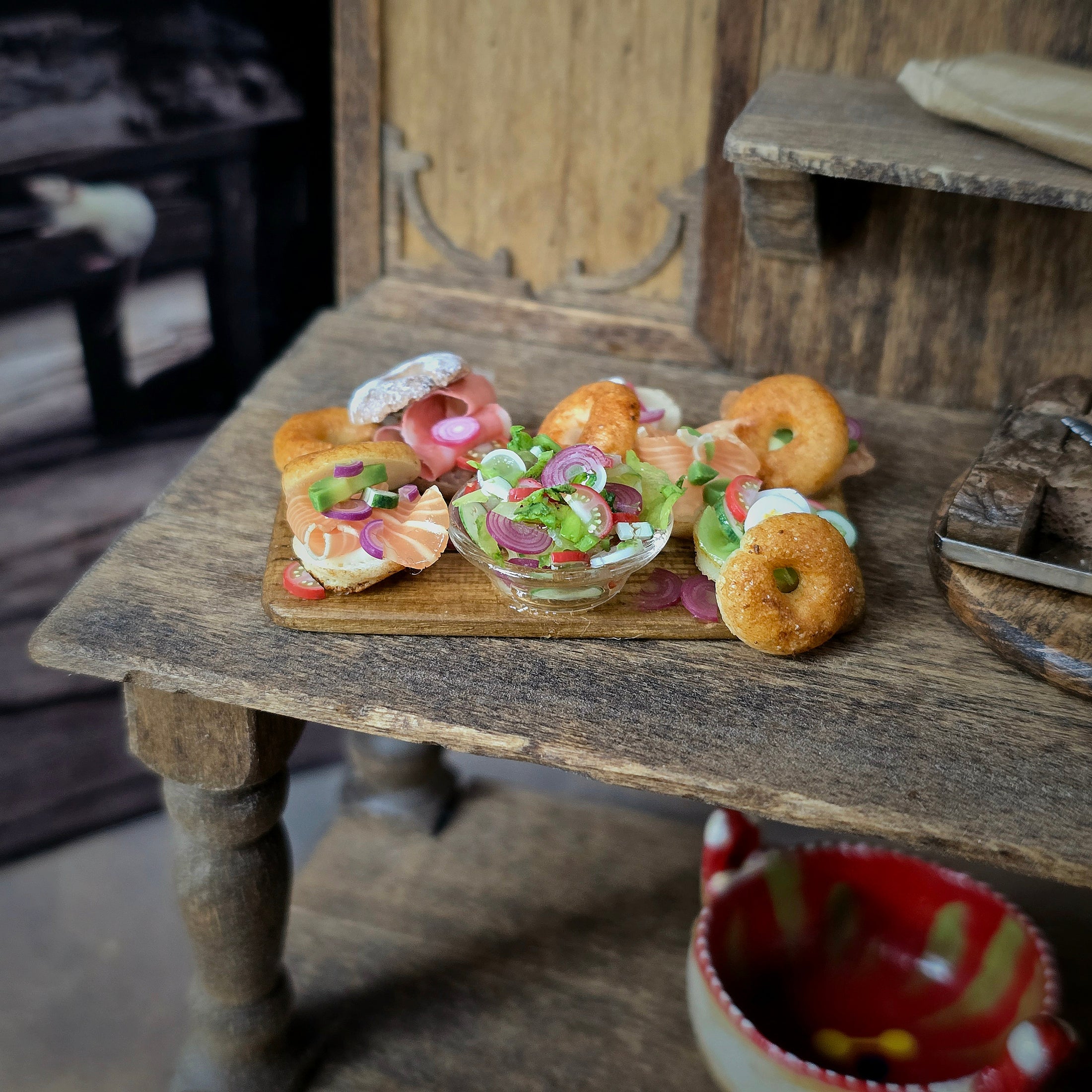 Miniature food items on a wooden table with a rustic background