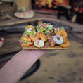 Load image into Gallery viewer, Brunch Bagel Charcuterie Serving Board on a single finger
