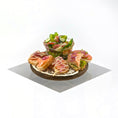 Load image into Gallery viewer, Platter of sandwiches and a bowl of salad on a white background
