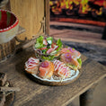 Load image into Gallery viewer, Small sandwiches and salad on a wooden table with a blurred background
