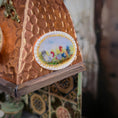 Load image into Gallery viewer, Decorative copper stove topper with a painted plaque featuring roosters.
