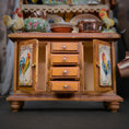 Load image into Gallery viewer, Wooden sideboard with rooster decorations on a dark background
