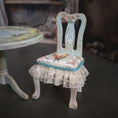 Load image into Gallery viewer, Decorative chair with a cushion featuring a rooster design, set against a blurred background.
