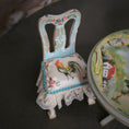 Load image into Gallery viewer, Decorative miniature chair with rooster design on a dark surface
