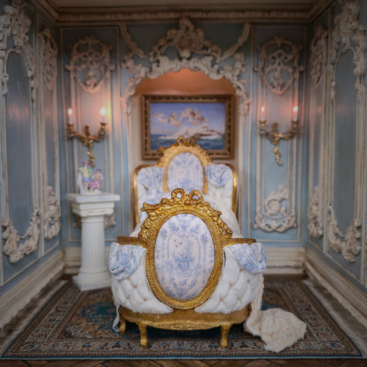 Decorative interior with ornate French bed and wall details
