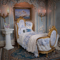 Load image into Gallery viewer, Decorative chair with gold frame and white cushions in an ornate room.
