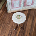 Load image into Gallery viewer, Small round table with a decorative dish on a wooden floor
