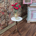 Load image into Gallery viewer, Miniature table with a vase of red roses and a tiny tray in a dollhouse setting
