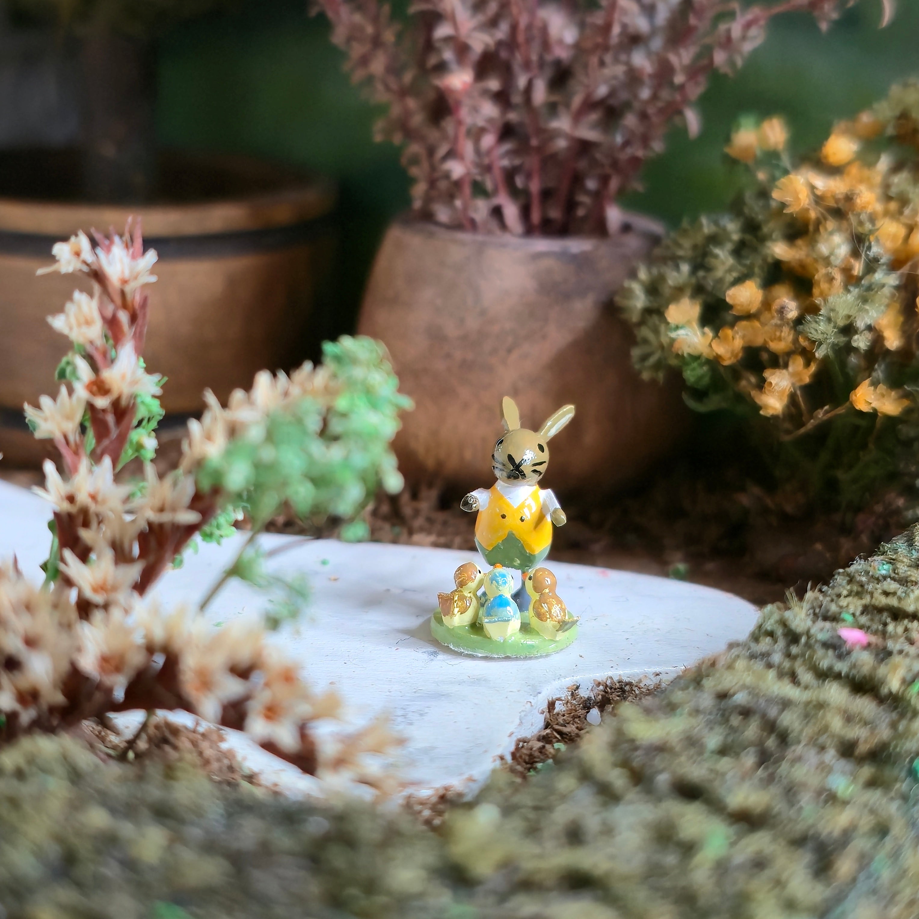 Hand Carved Wooden Folk Art Figurine of a Bunny Conductor with Singing Chicks