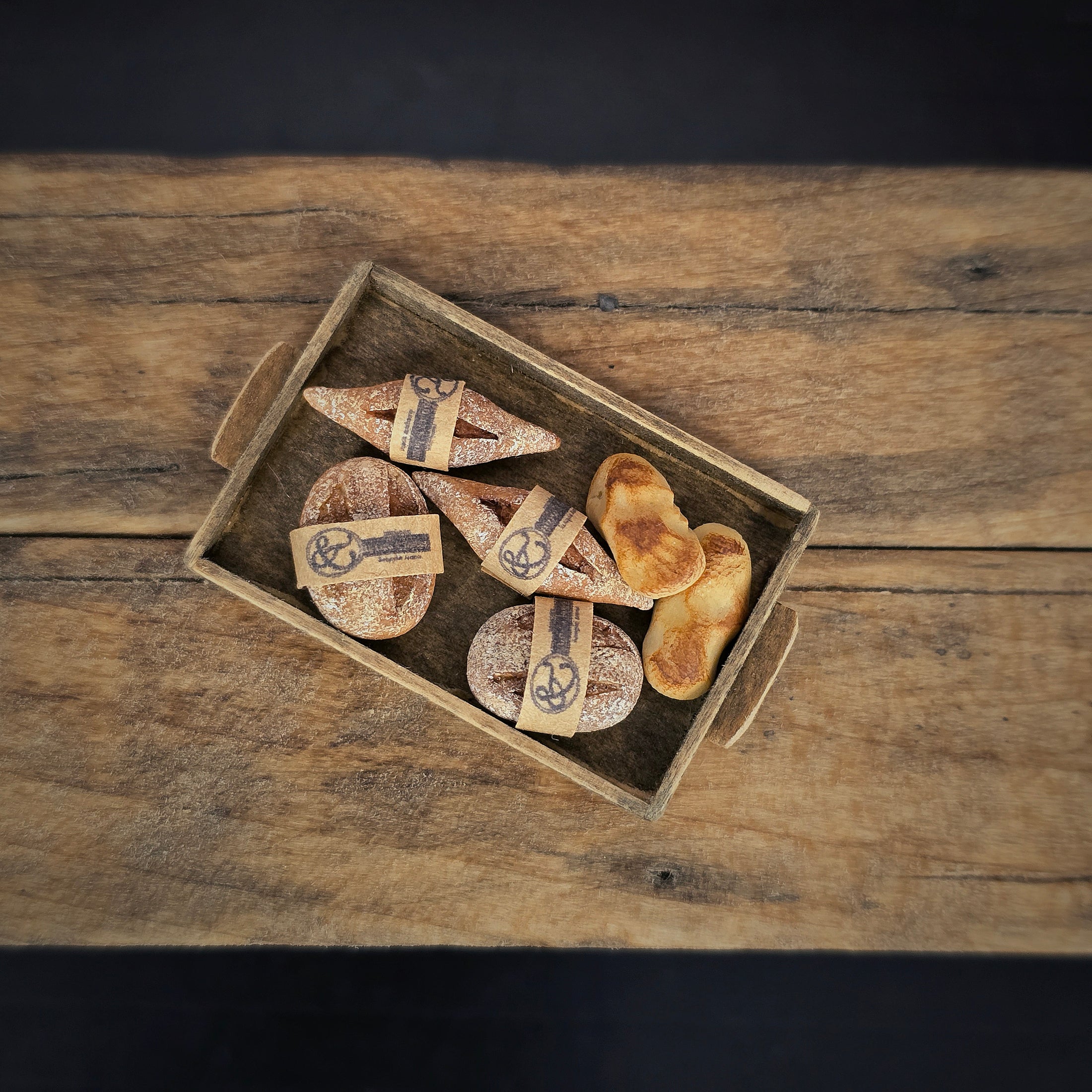 Tomo Tanaka Nunu’s House Wrapped Rustic Artisan Bread in Bakery Tray