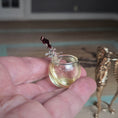 Load image into Gallery viewer, Fatima Doña "Black Moor Goldfish Jumping" Tipped Fish Bowl Sculpture
