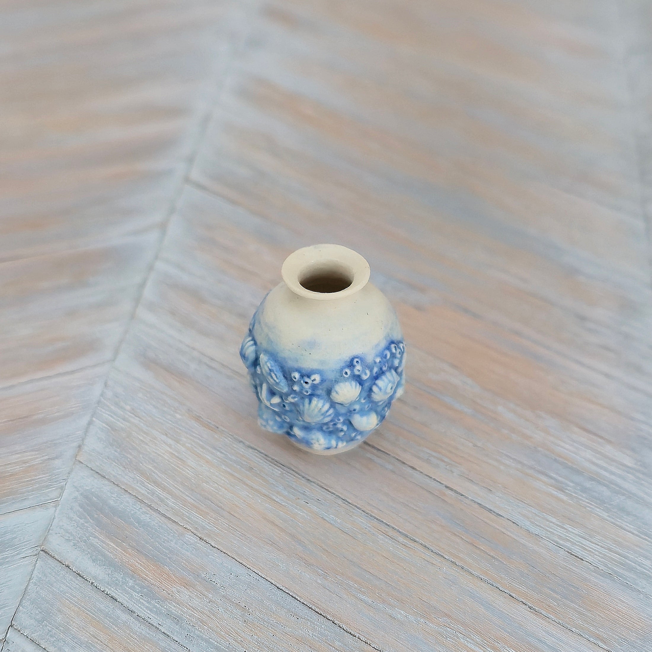 Blue & Cream Sea Life Relief Vase by IGMA Susan Van Tubbergen