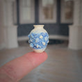 Load image into Gallery viewer, Blue & Cream Sea Life Relief Vase by IGMA Susan Van Tubbergen
