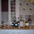 Load image into Gallery viewer, Taller Targioni Globe Bar Cart with Blown Glass Wine Bottles & Glasses
