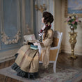 Load image into Gallery viewer, Victorian Lady Reading Scrapbook Porcelain Doll With Chair Dana Burton
