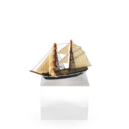 Vintage Artisan Hand-Carved Sailing Ship Miniature with Fabric Sails