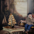 Load image into Gallery viewer, Vintage Artisan Hand-Carved Sailing Ship Miniature with Fabric Sails
