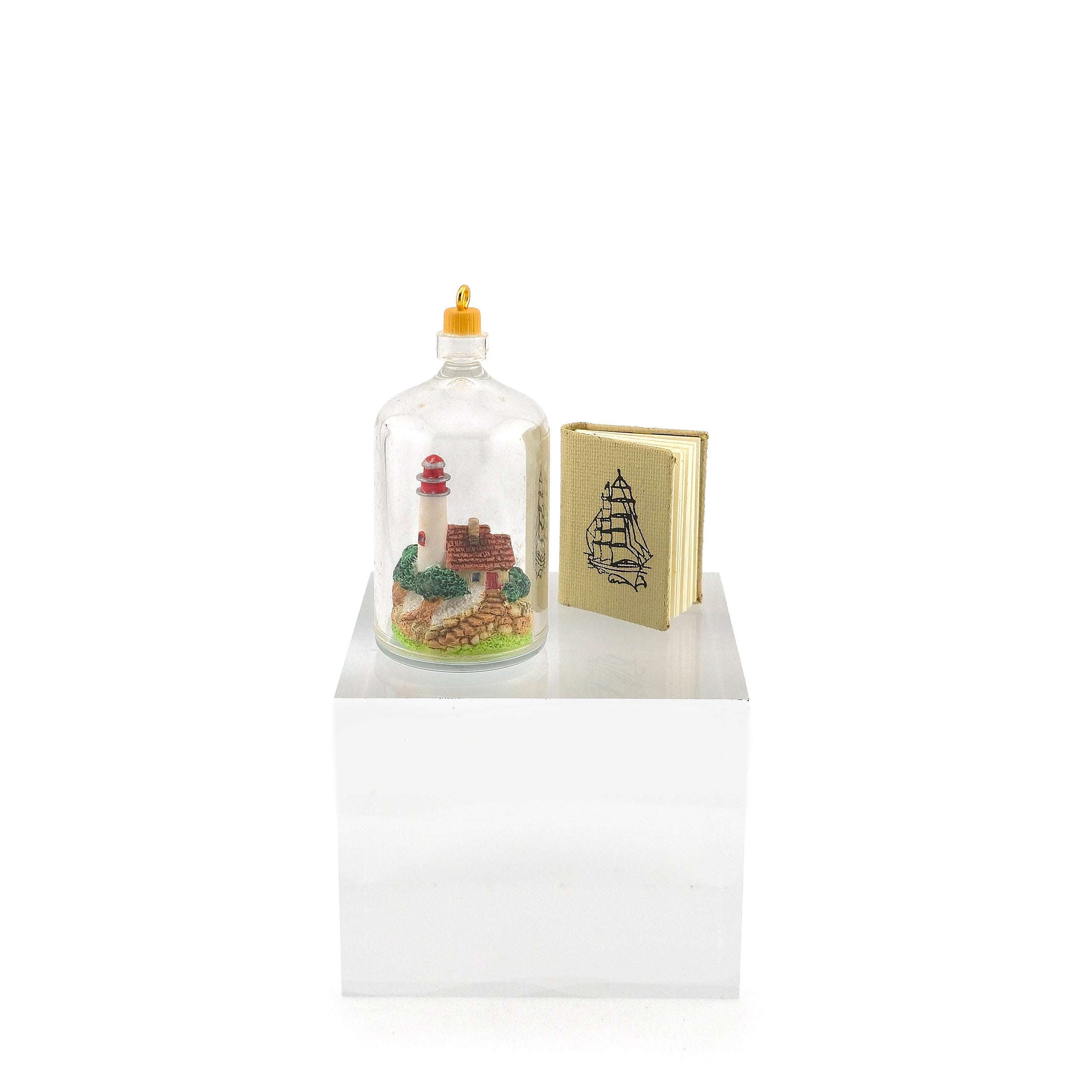 Mosaic Press Scrimshaw Book and Lighthouse in Bottle Nautical Display