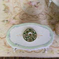 Load image into Gallery viewer, Teresa Welch 2014 Green & Pink Rose 4-Piece Place Setting
