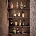 Load image into Gallery viewer, Set of 15 Miniature Witch’s Potion Bottles Halloween Spooky Decor
