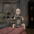 Load image into Gallery viewer, Curiosity Clock-Faced Bisque Doll Oddity Assemblage in 1:12 Scale
