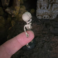 Load image into Gallery viewer, Clay Oddities Skeleton on Black Display Base Spooky Decor in 1:12 Scale
