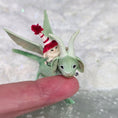 Load image into Gallery viewer, Aleah Klay Tiny Elf Riding Green Dragon with Winter Hat & Wire Reins 1:12 Scale
