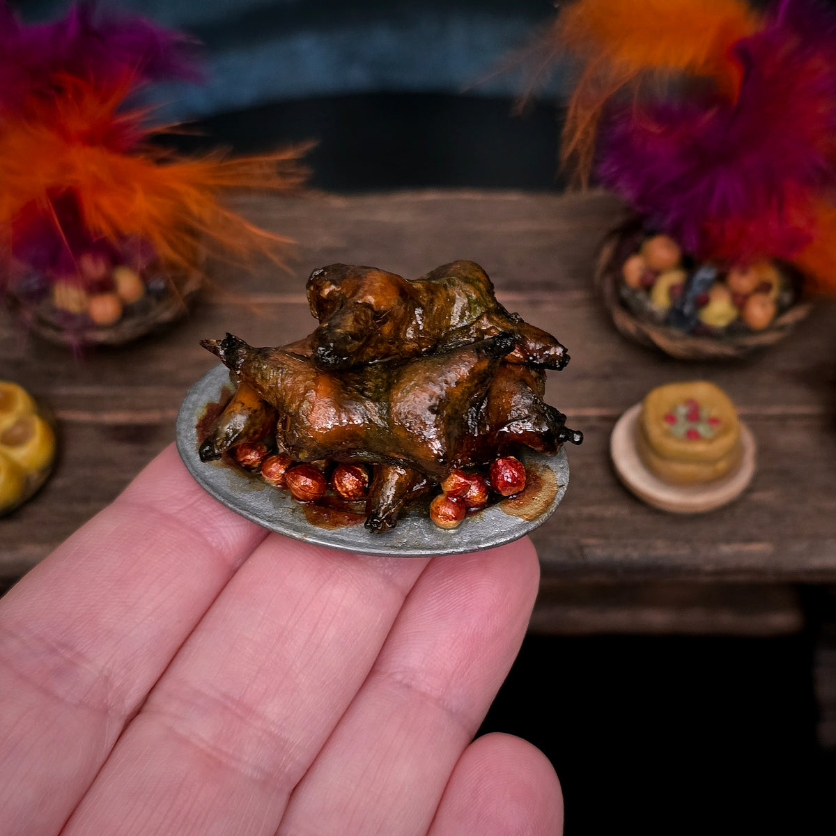 Val Adams Gramarye Keep Roasted Pig Pieces with Potatoes on Pewter Platter