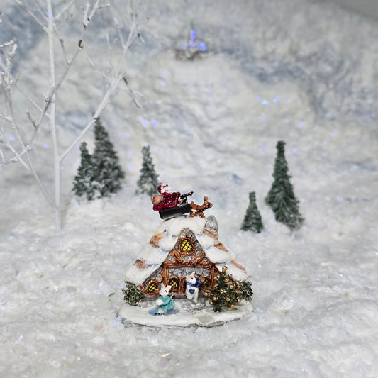 Sharon Secord 1:12 Porcelain Christmas Cottage with Santa Sleigh & Rabbits Scene