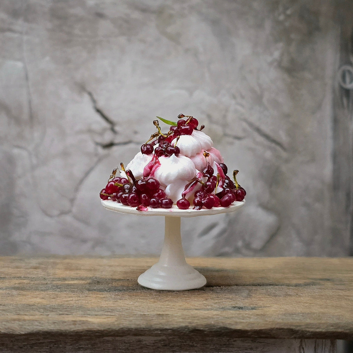 Gosia Suchodolska Miniature Berry Pavlova Dessert on White Pedestal Stand