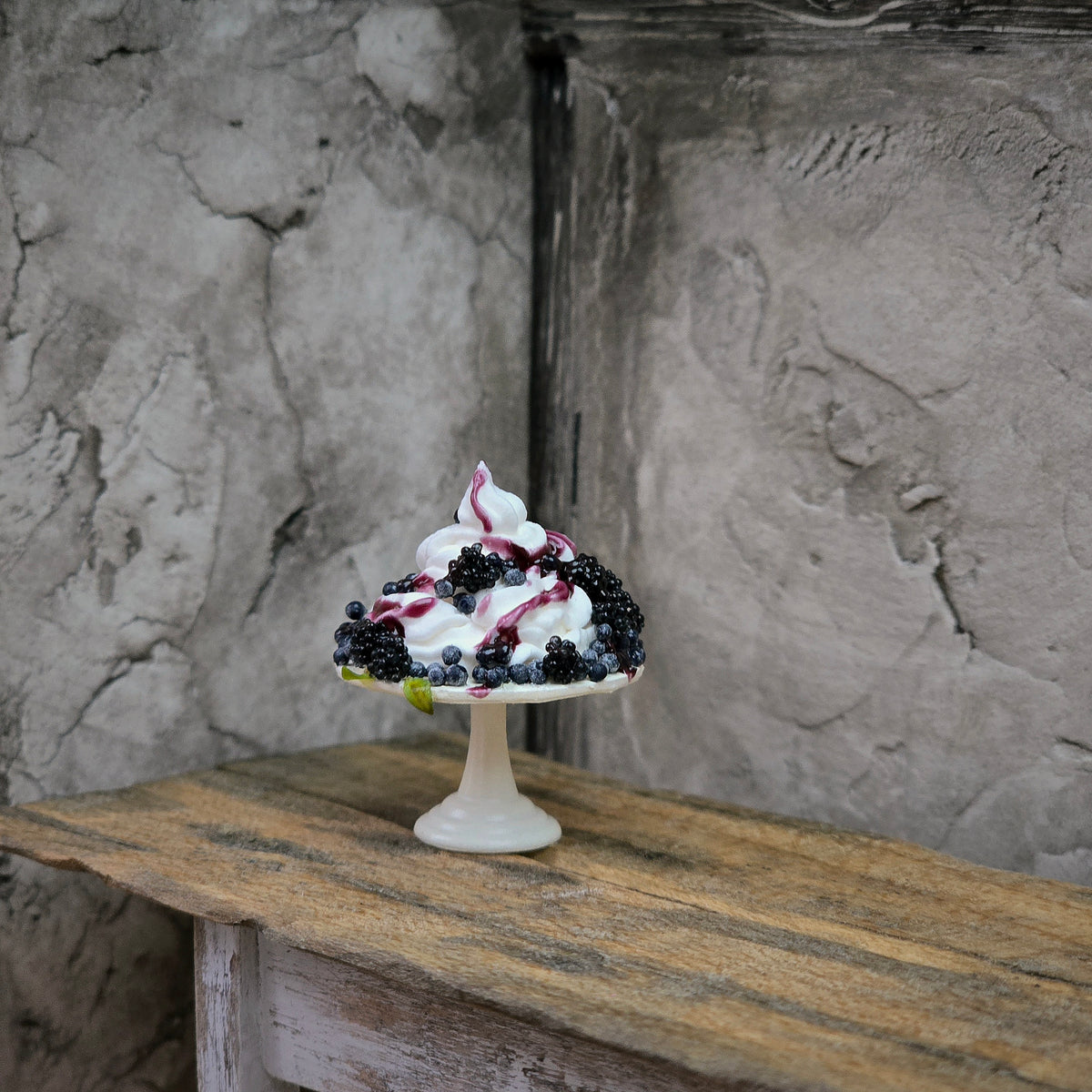 Gosia Suchodolska Miniature Blackberry & Blueberry Pavlova on White Porcelain Stand
